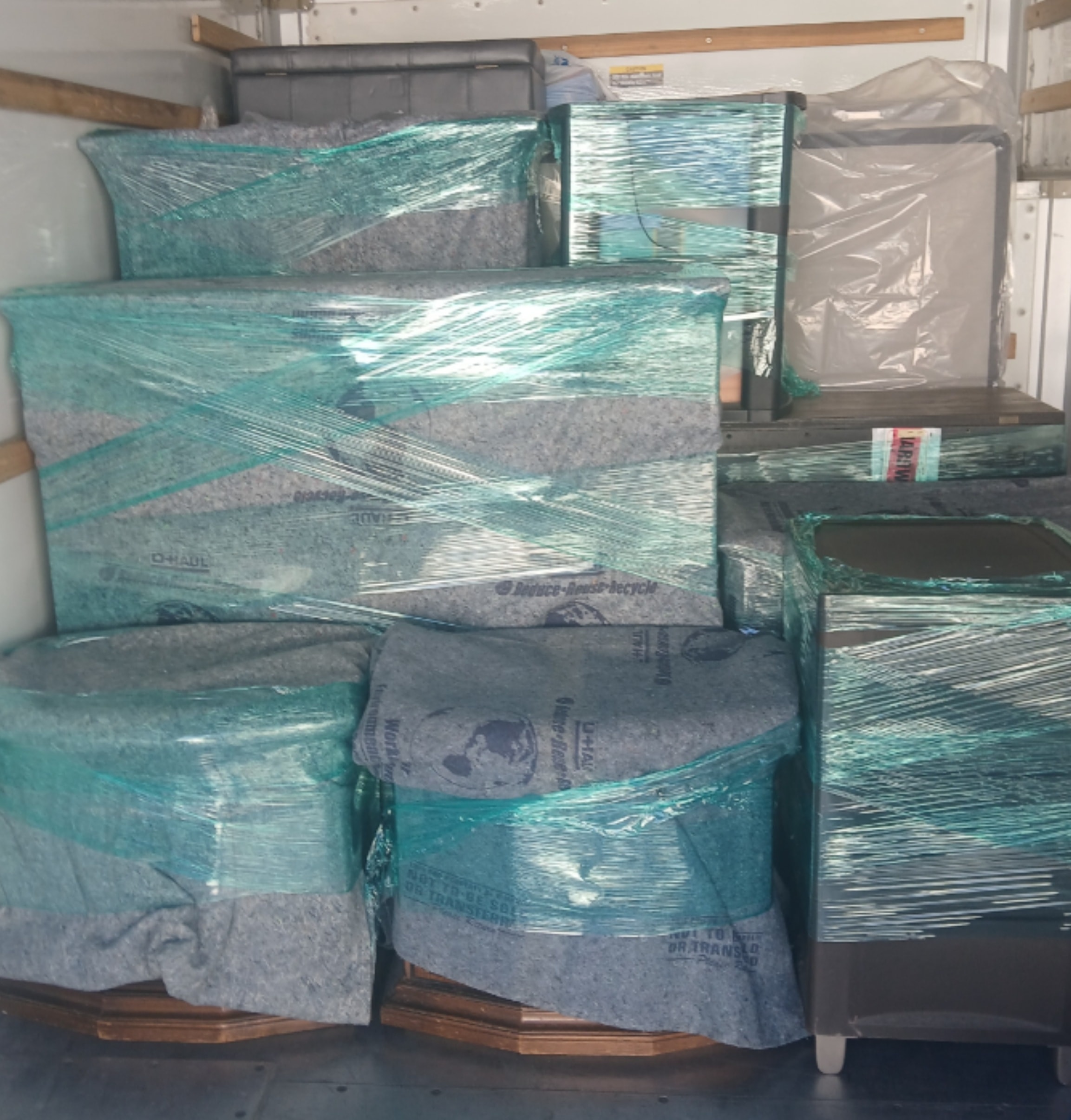 Above Average Movers Plus team loading a truck